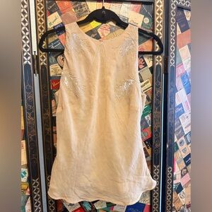 Chic Beige Sleeveless Blouse with Embellishments